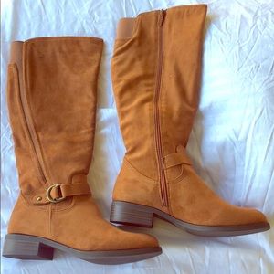 Light brown suede boots. Never been worn, size 7